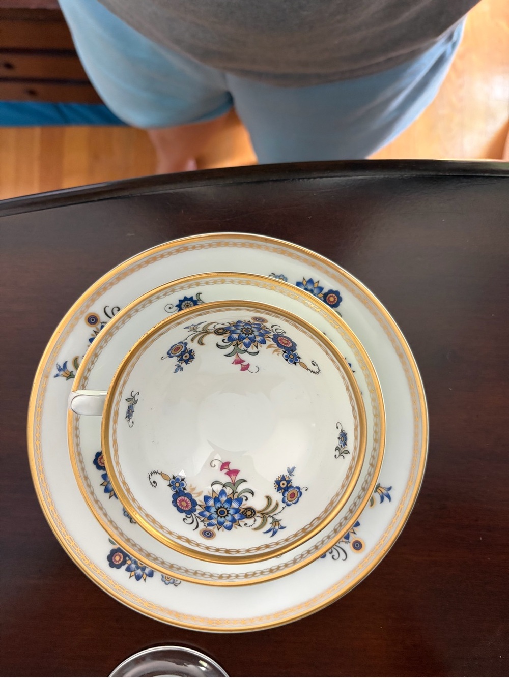 Fine Porcelain Gold-Trimmed Blue Floral Tea Cup and Saucer Set